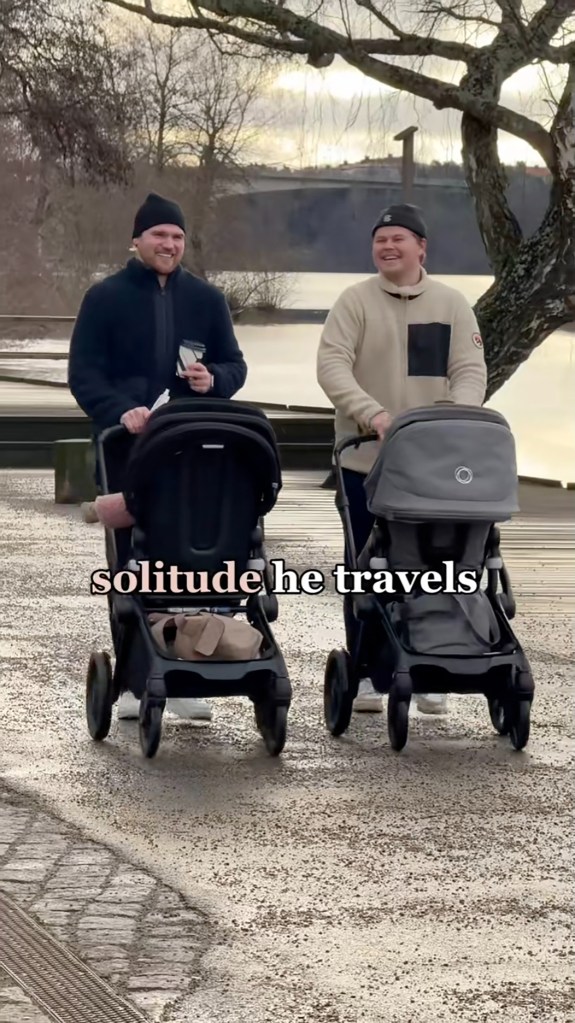 Two parents push strollers.
